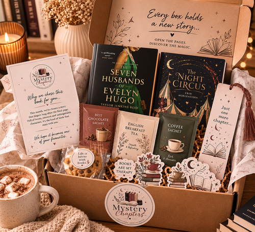 A curated book gift box arranged in a cardboard box with printed inserts and bookmarks. Visible items include the books 'The Seven Husbands of Evelyn Hugo' and 'The Night Circus' by Taylor Jenkins Reid, a 'Mystery Book Club' card, a 'Hot Chocolate Smock', an 'English Breakfast Tea' card, a 'Coffee Smock', and decorative book-themed ornaments and tags.